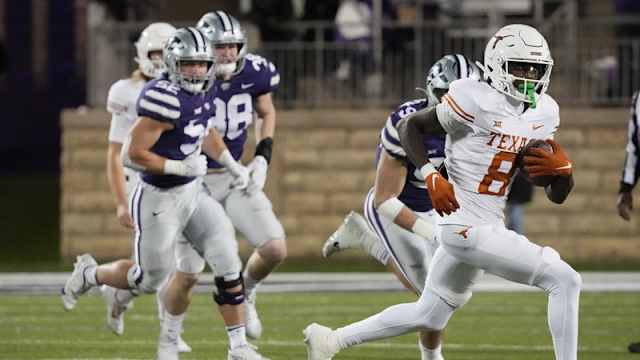 Texas Longhorns wide receiver Xavier Worthy (8) carries the ball during the Texas Longhorns football game against Kansas State at Bill Snyder Family Stadium in Manhattan, Kansas on Saturday, Nov. 5, 2022. 